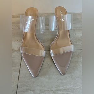 Sexy stiletto heel. Nude Clear pointed toe heel.